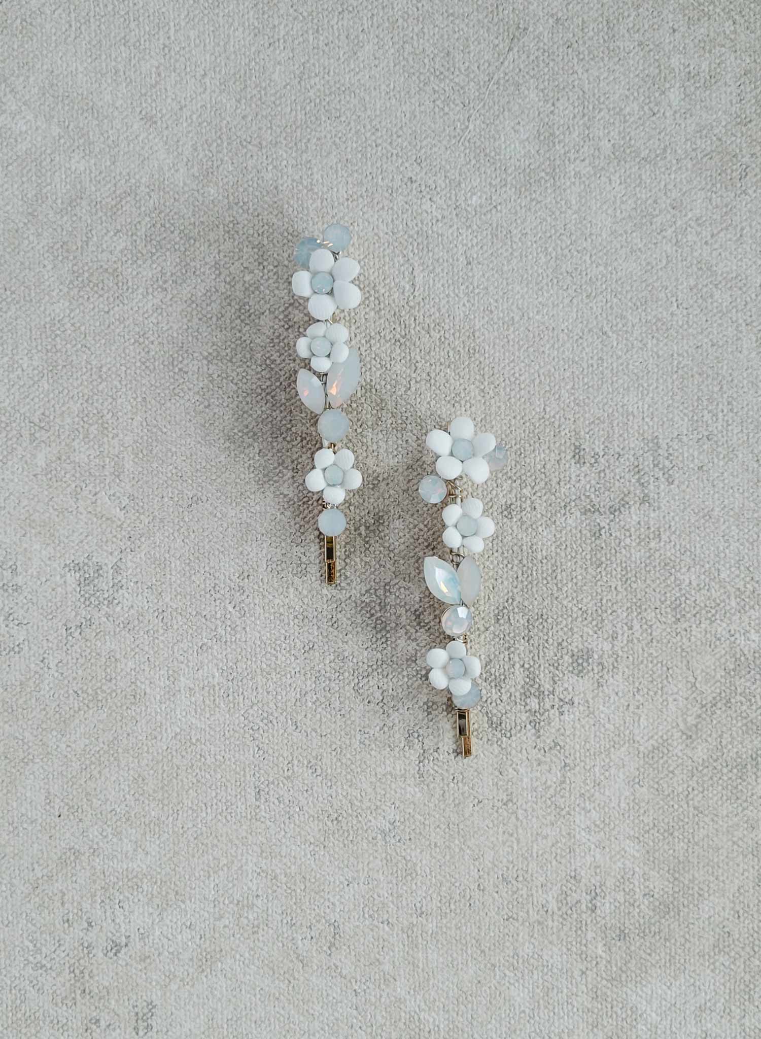 tiny porcelain blossom and opal crystal bridal bobby pins. Hair accessory by Twigs and Honey