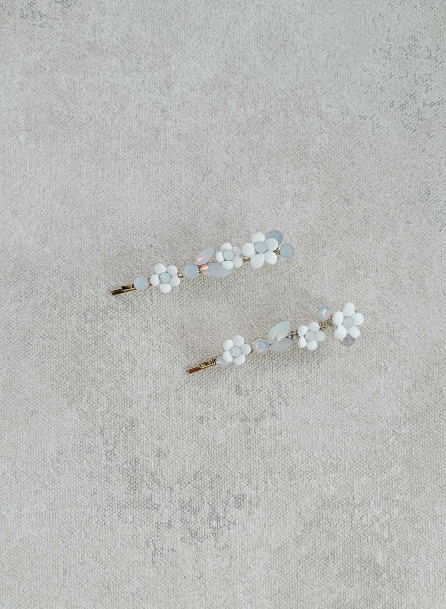 tiny porcelain blossom and opal crystal bridal bobby pins. Hair accessory by Twigs and Honey