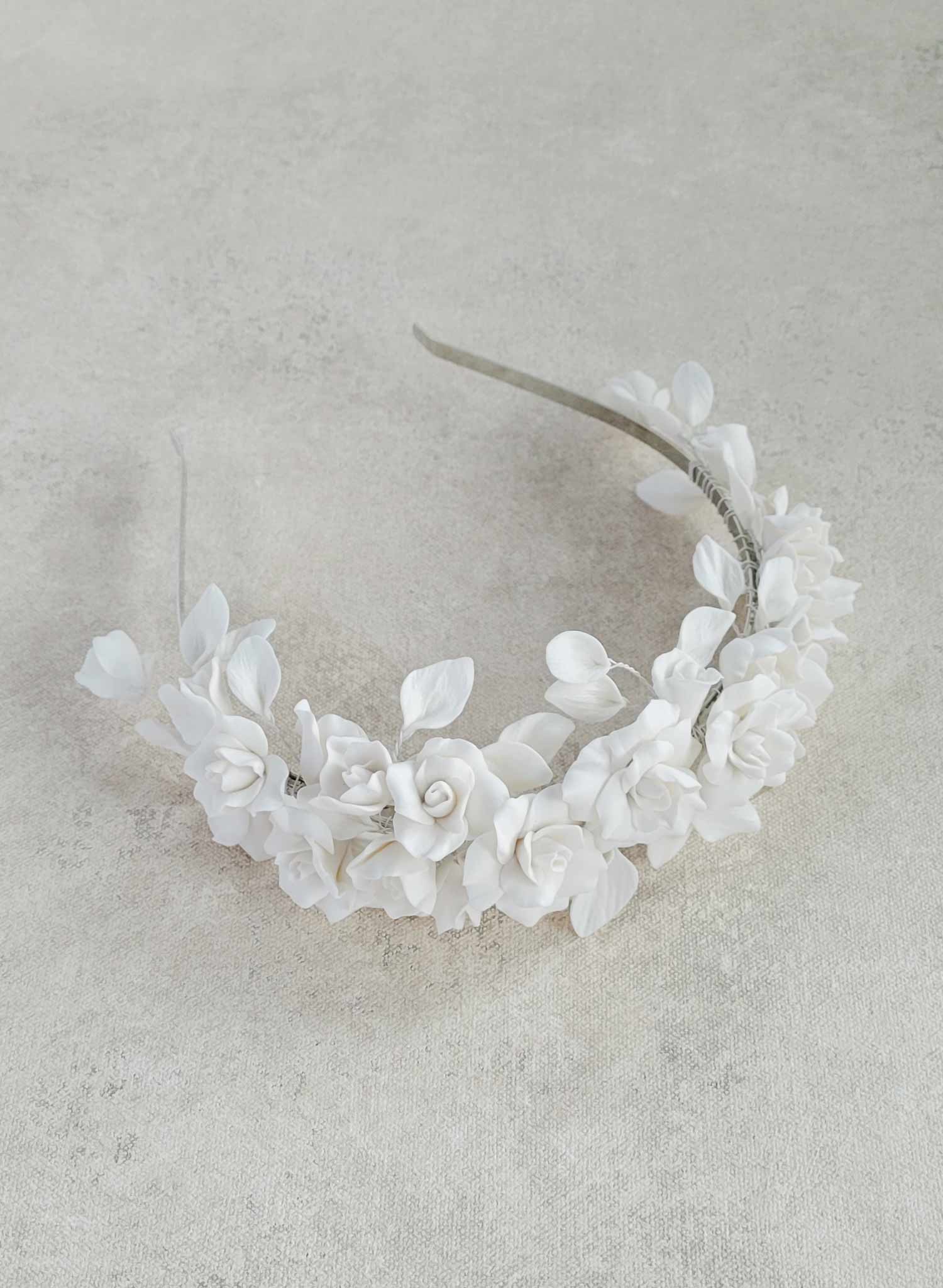 Clean white rosette clay flower bridal headband, crown, tiara. Handmade by Twigs and Honey