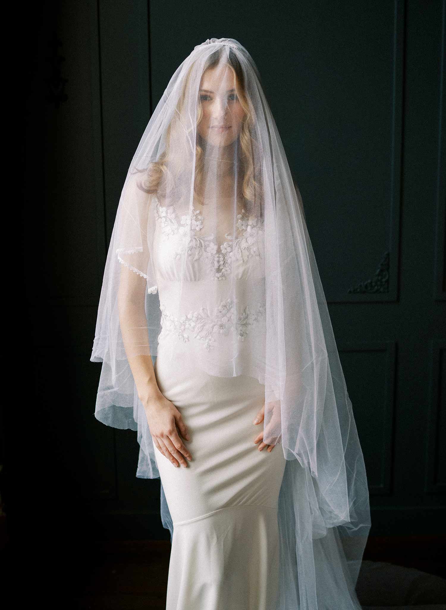 Luxurious wedding veil with blusher and chapel length train made from silk tulle