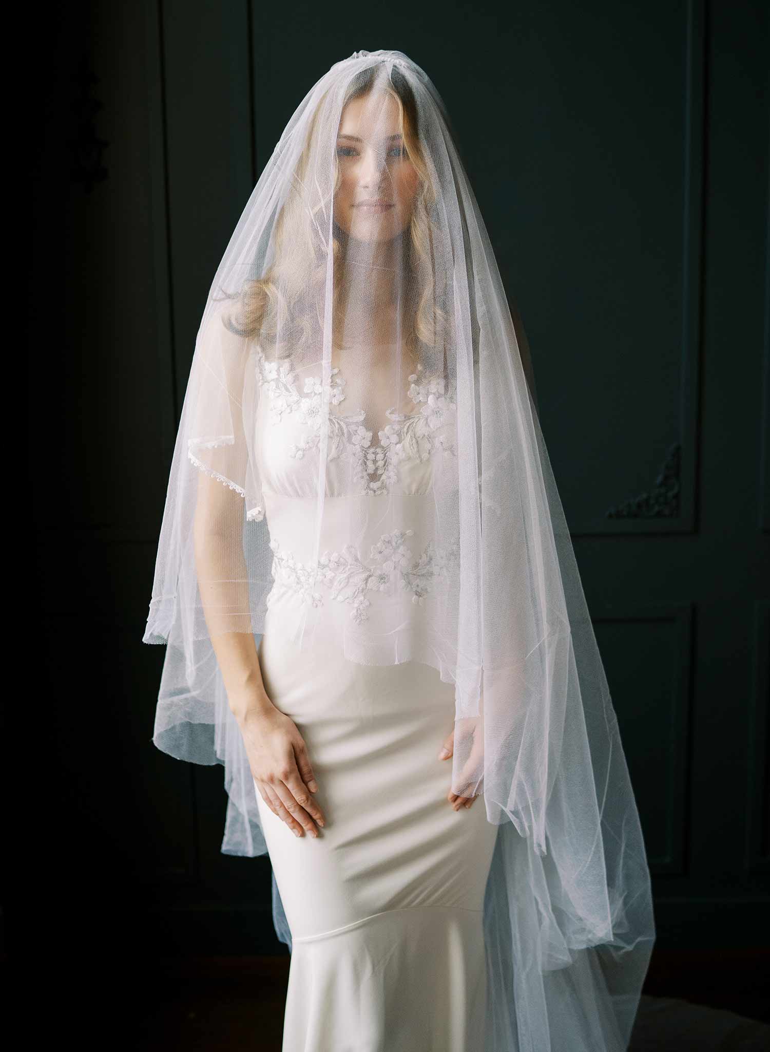 Luxurious wedding veil with blusher and chapel length train made from silk tulle