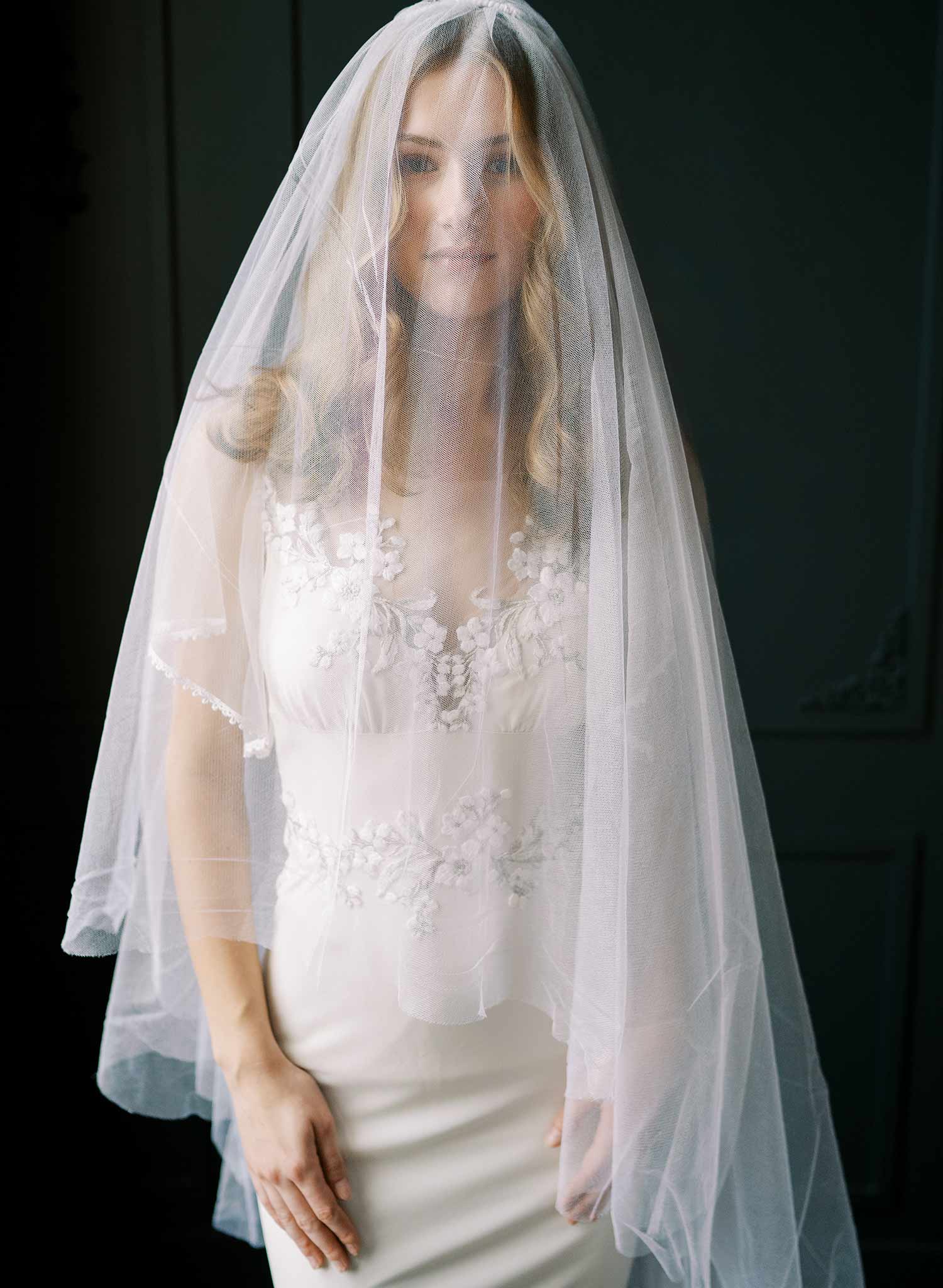 Luxurious wedding veil with blusher and chapel length train made from silk tulle