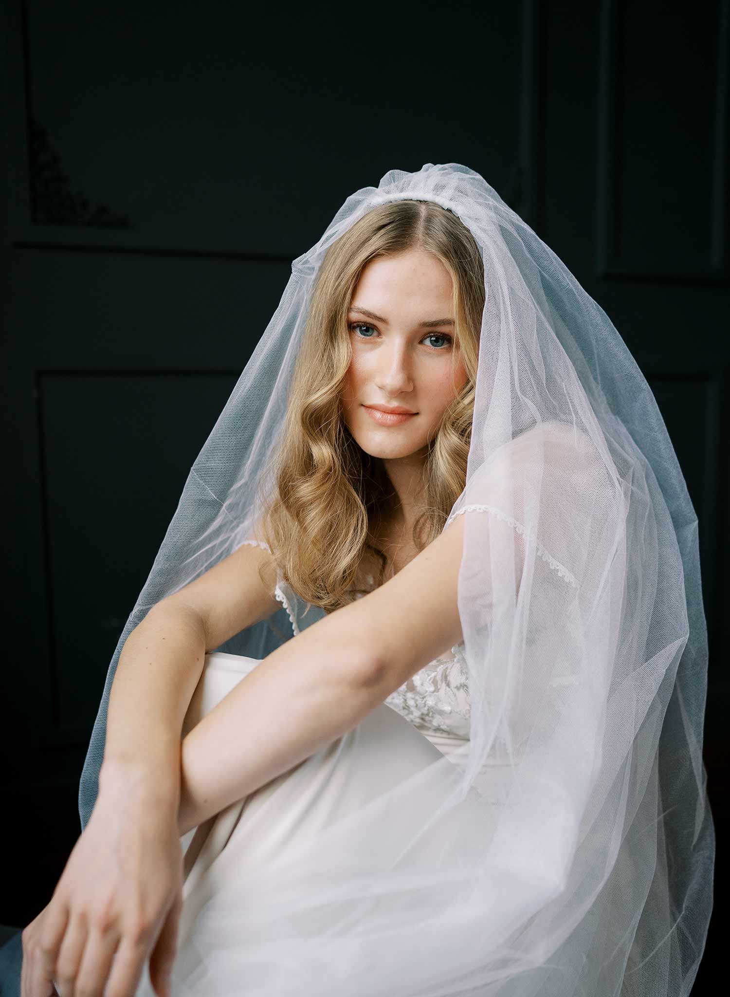 Luxurious wedding veil with blusher and chapel length train made from silk tulle