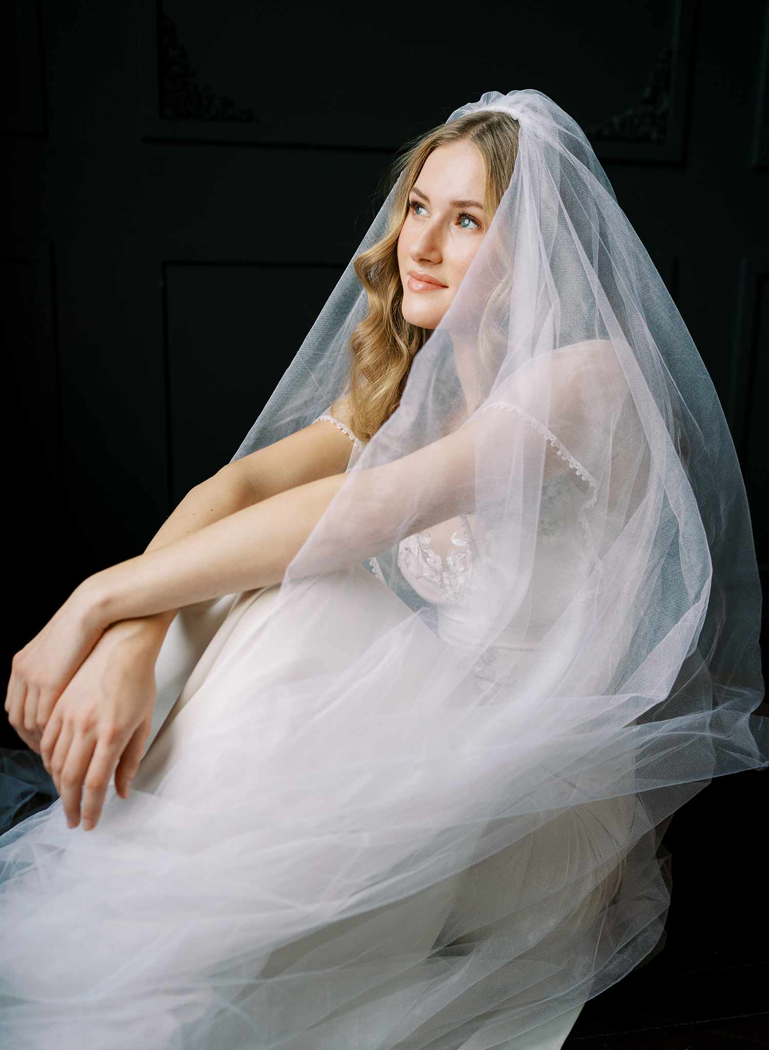 Luxurious wedding veil with blusher and chapel length train made from silk tulle