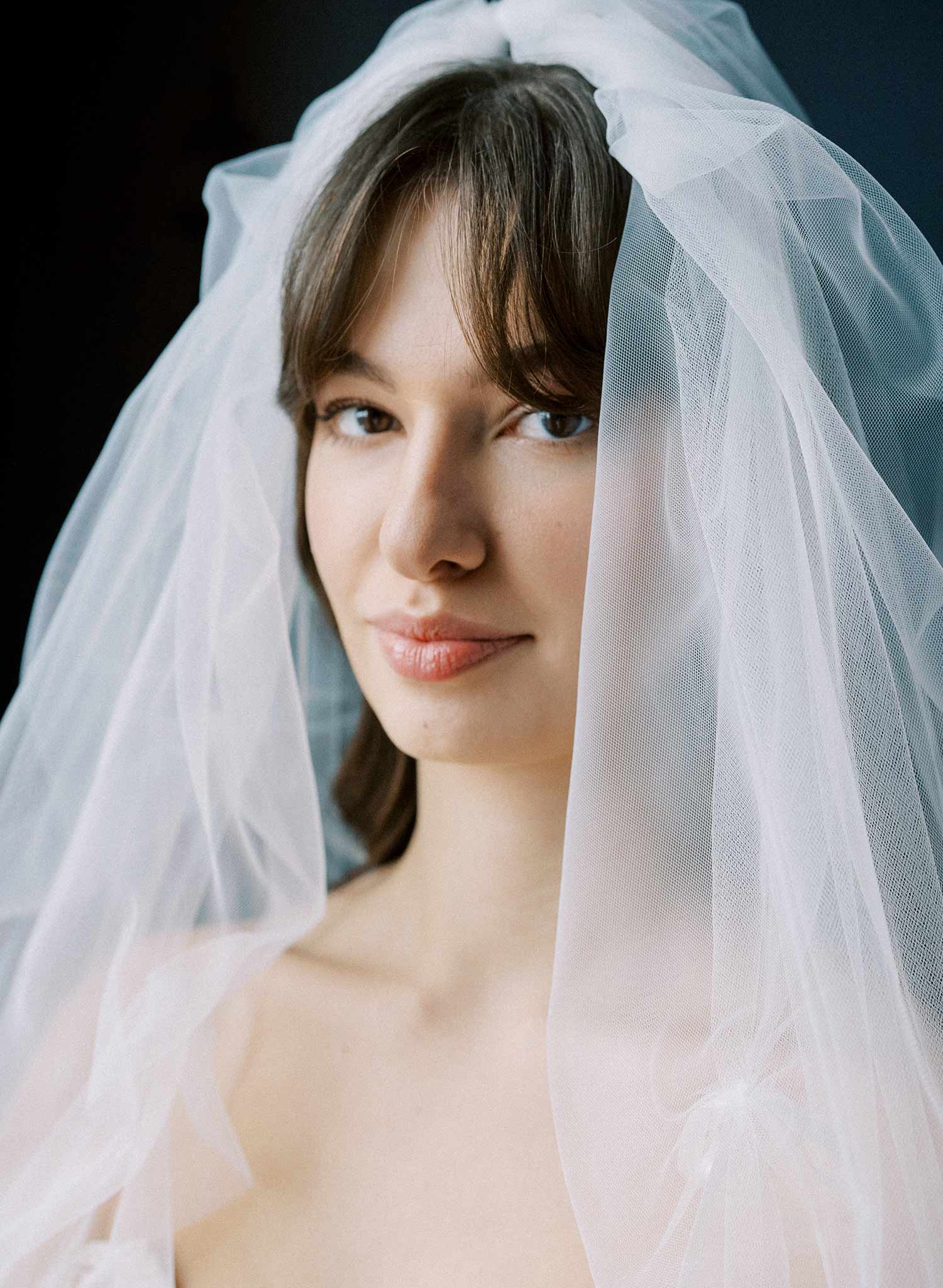 Gathered and ruched bridal tulle veil with silk bows. Victorian era inspired. 