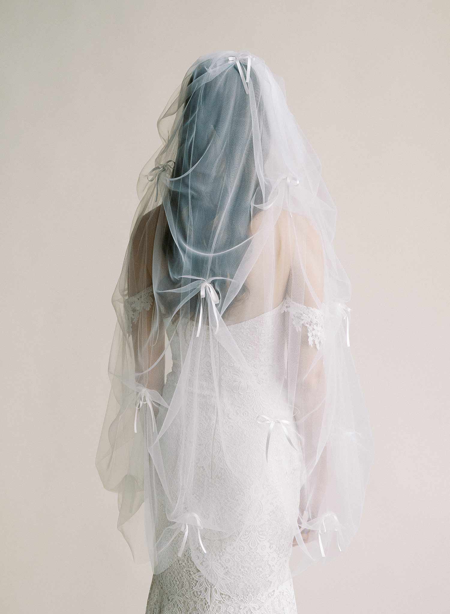 Gathered and ruched bridal tulle veil with silk bows. Victorian era inspired. 