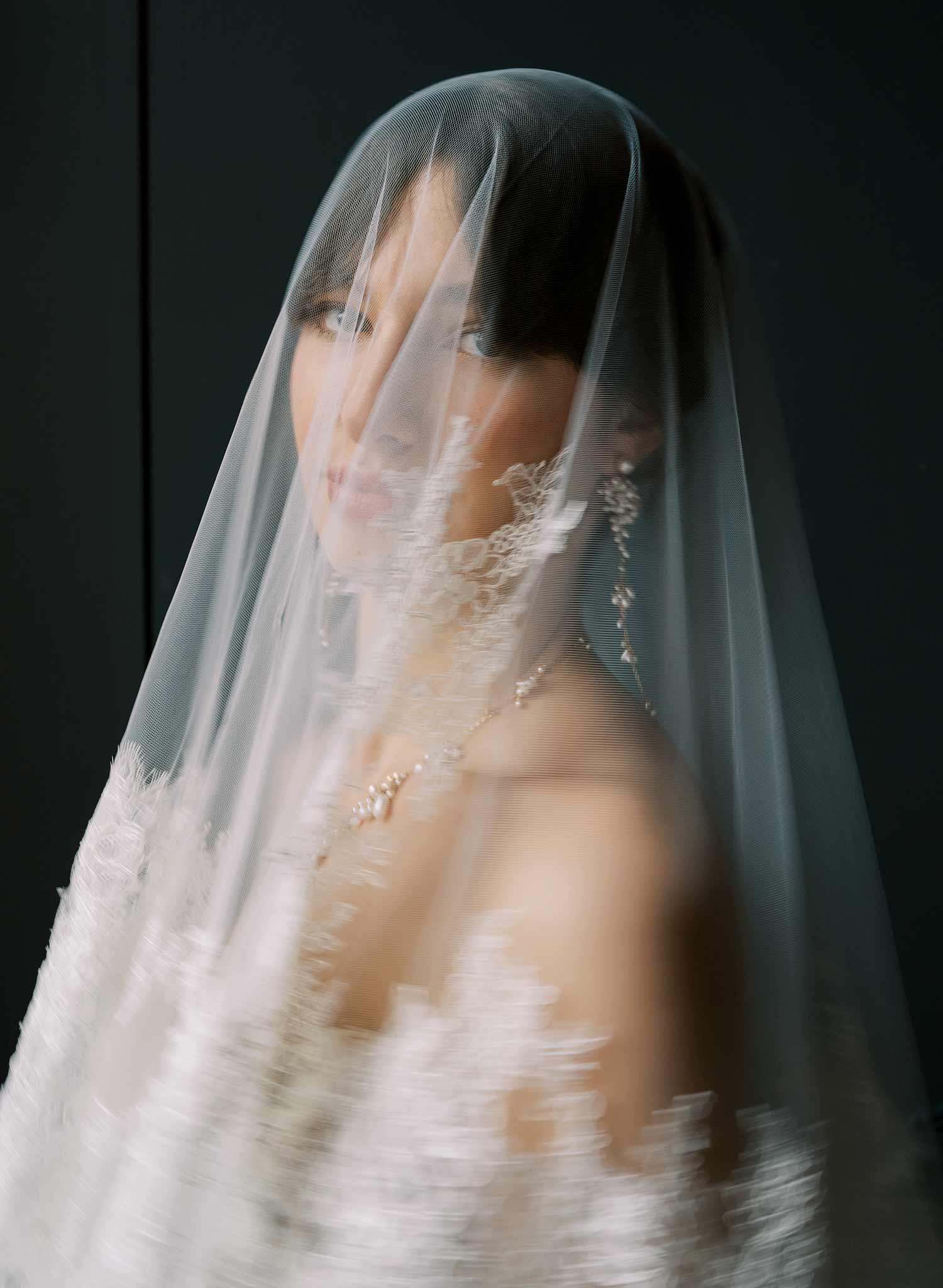 Modern, abstract alencon lace trimmed bridal veil with blusher by Twigs and Honey.