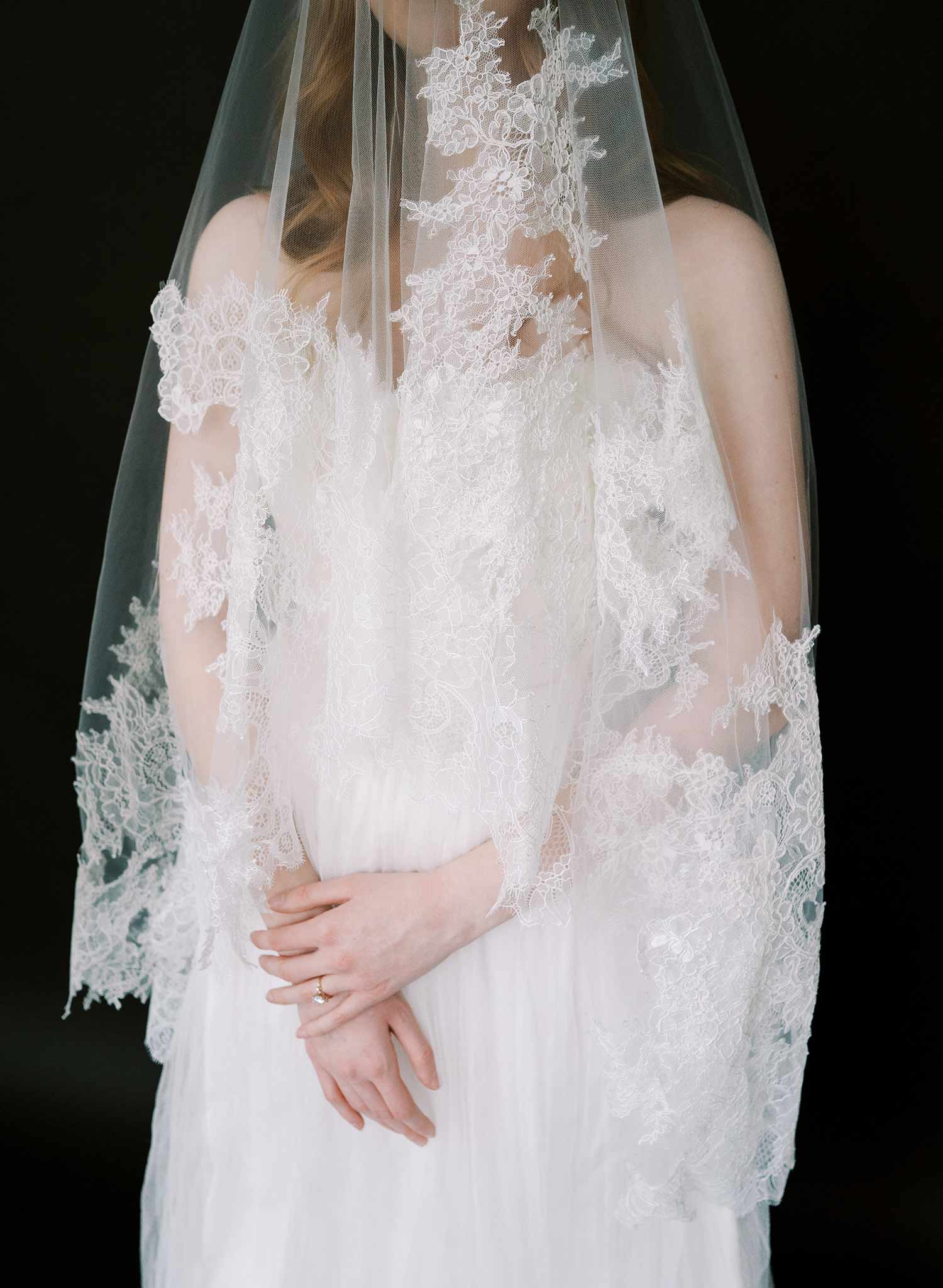 Modern, abstract alencon lace trimmed bridal veil with blusher by Twigs and Honey.