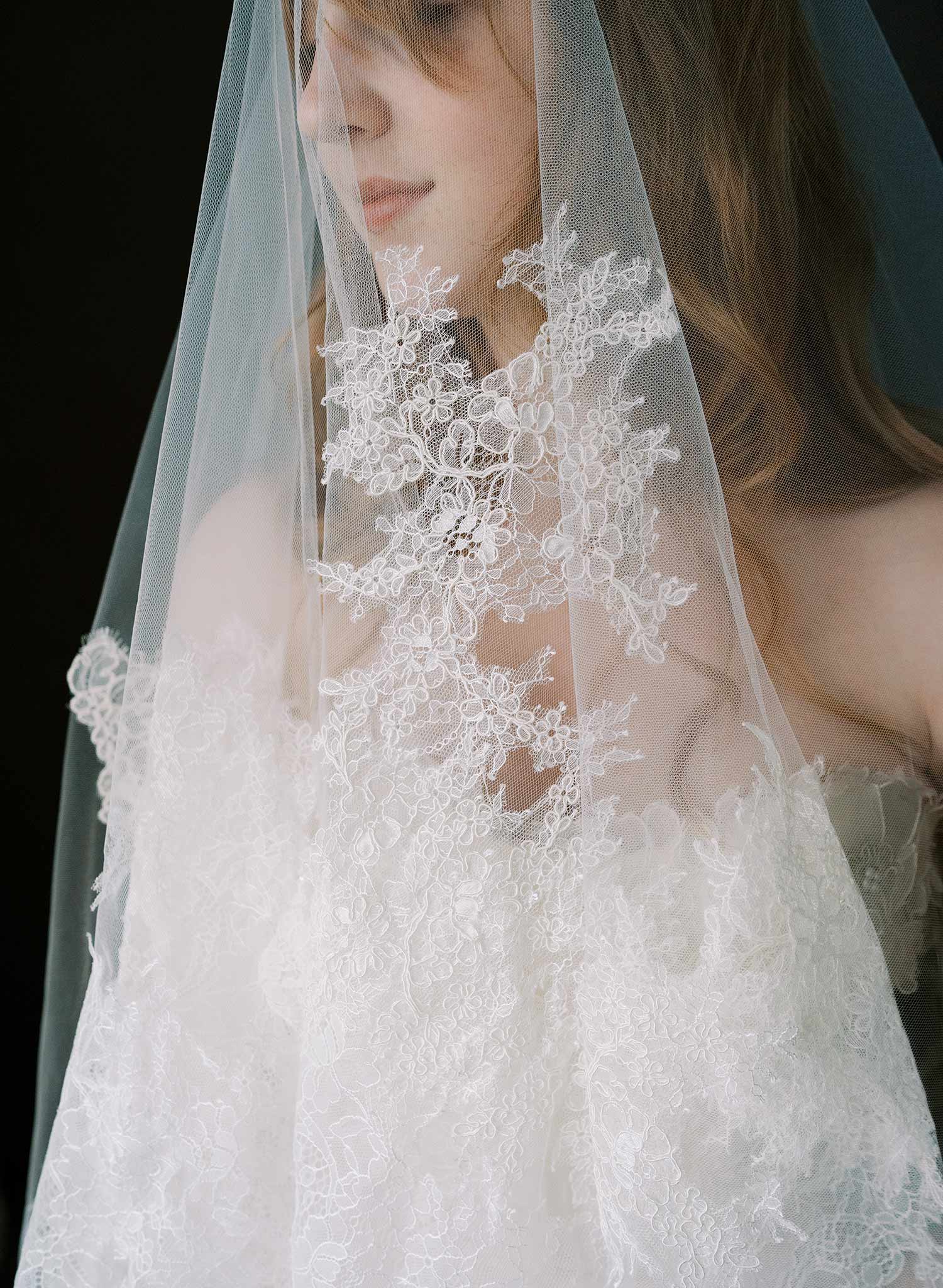 Modern, abstract alencon lace trimmed bridal veil with blusher by Twigs and Honey.