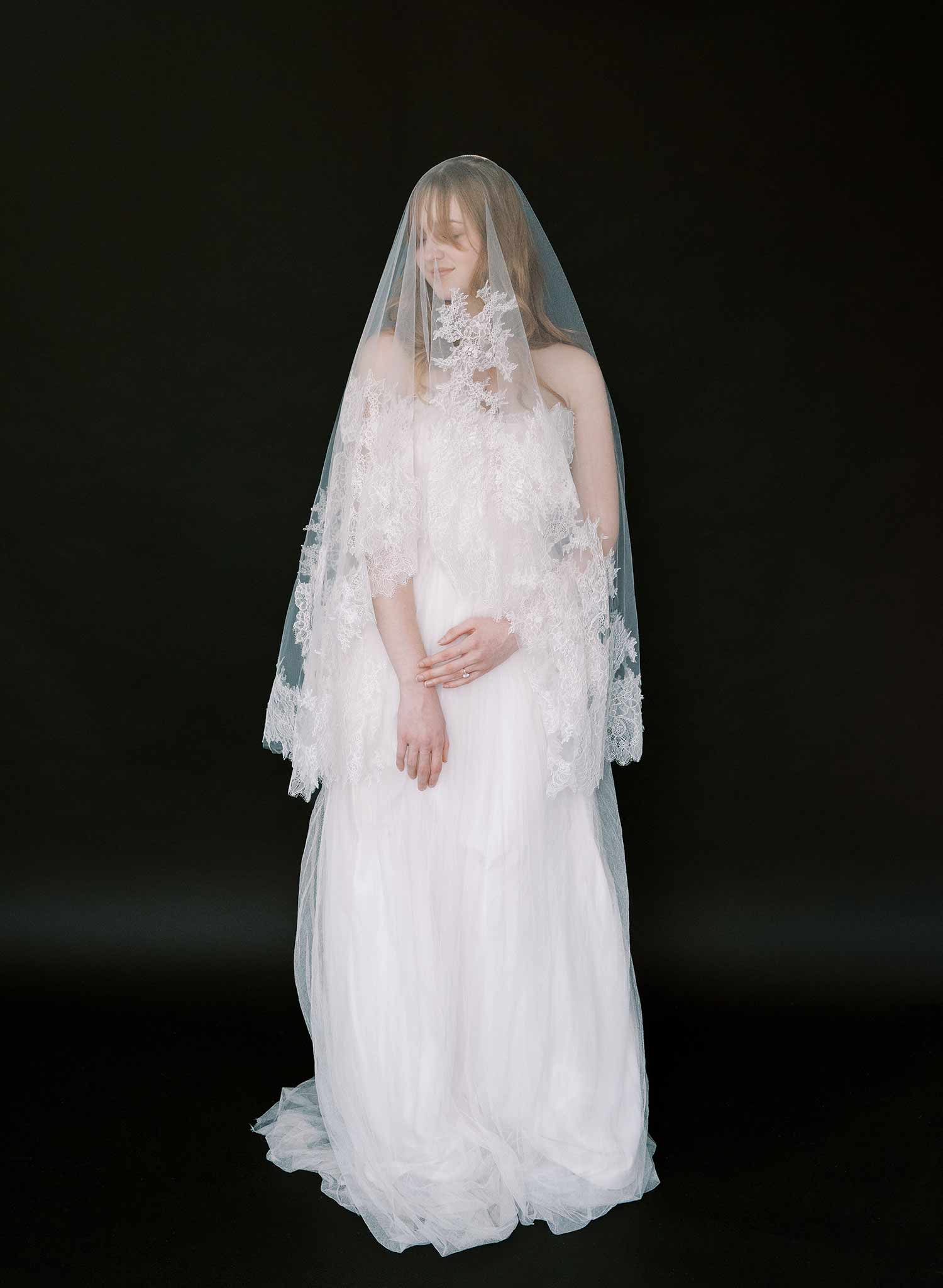 Modern, abstract alencon lace trimmed bridal veil with blusher by Twigs and Honey.