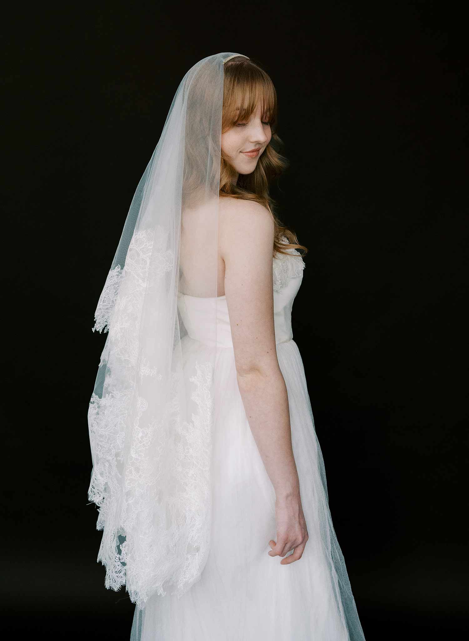 Modern, abstract alencon lace trimmed bridal veil with blusher by Twigs and Honey.