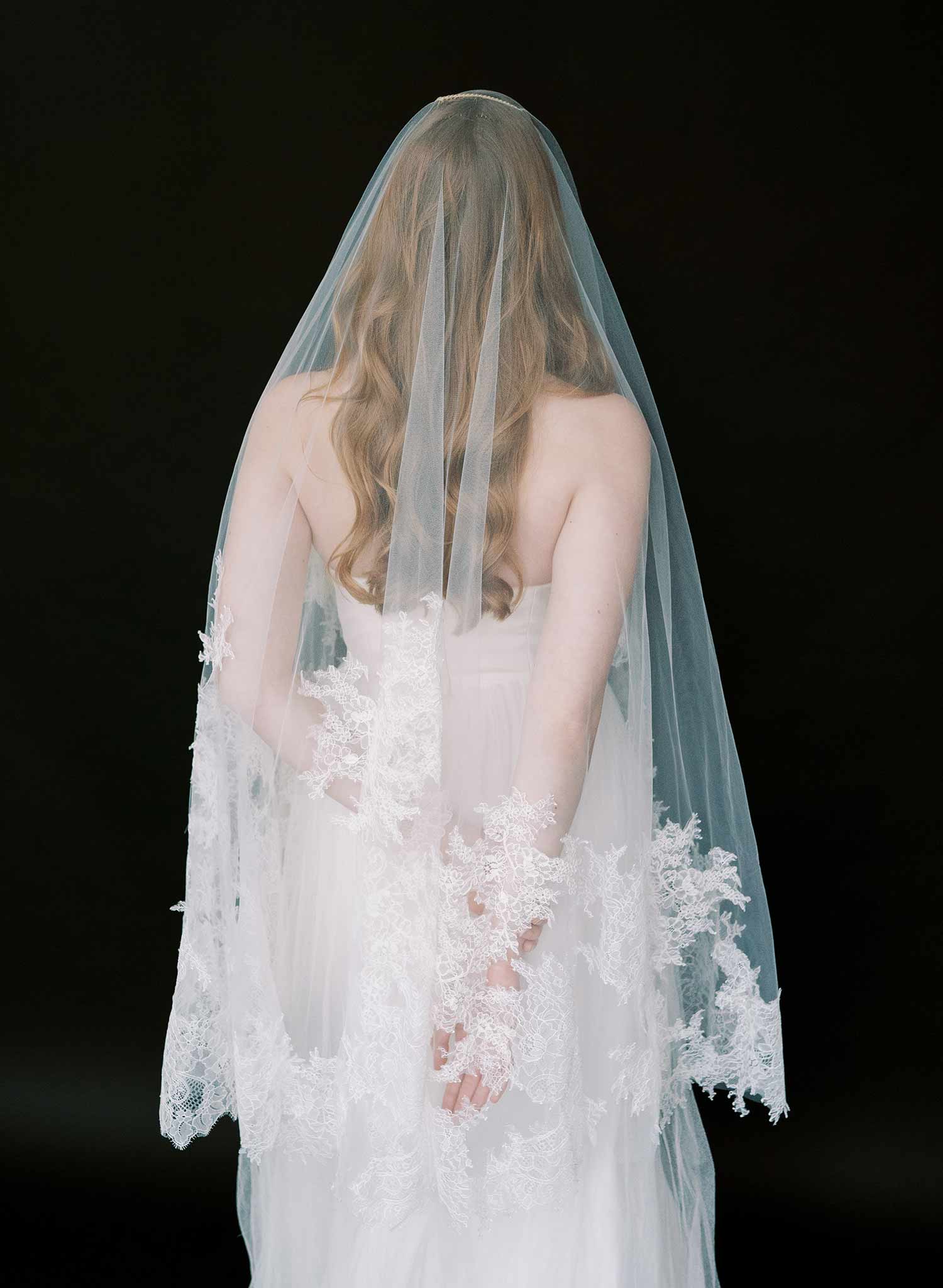 Modern, abstract alencon lace trimmed bridal veil with blusher by Twigs and Honey.