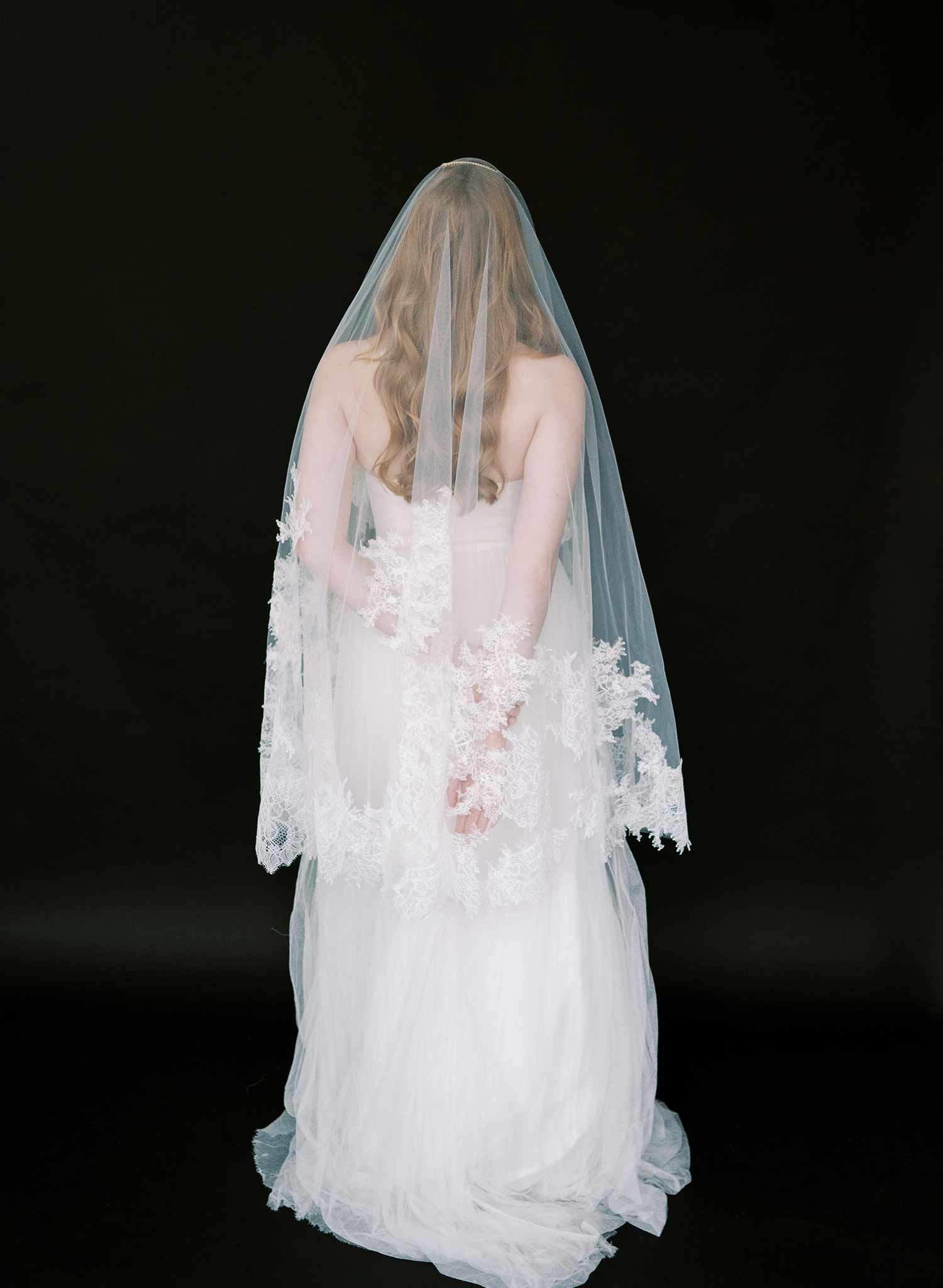 Modern, abstract alencon lace trimmed bridal veil with blusher by Twigs and Honey.