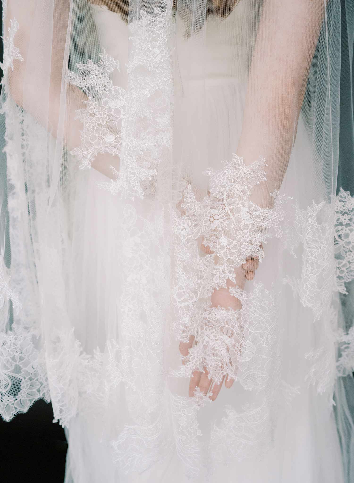 Modern, abstract alencon lace trimmed bridal veil with blusher by Twigs and Honey.