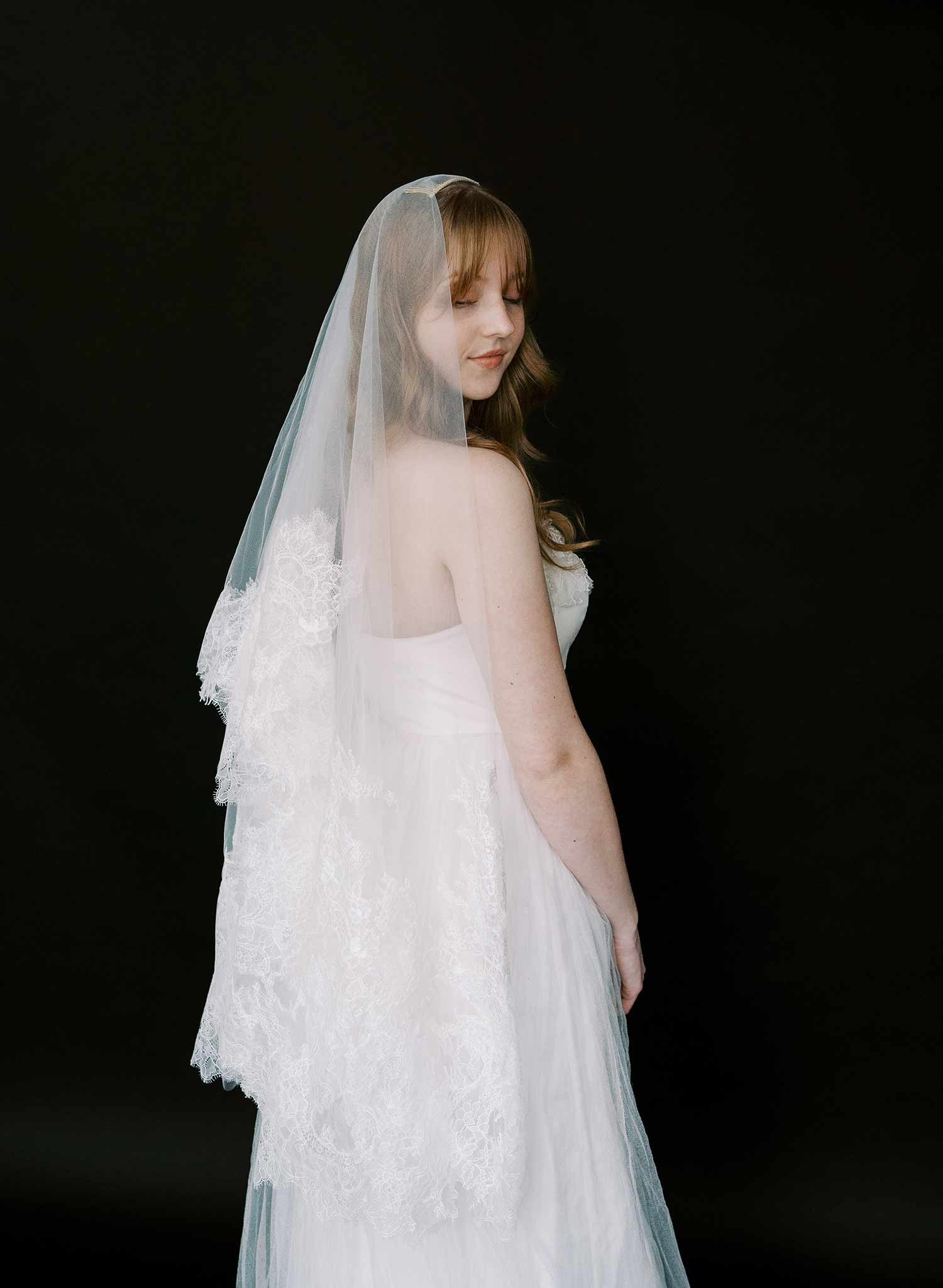 Modern, abstract alencon lace trimmed bridal veil with blusher by Twigs and Honey.