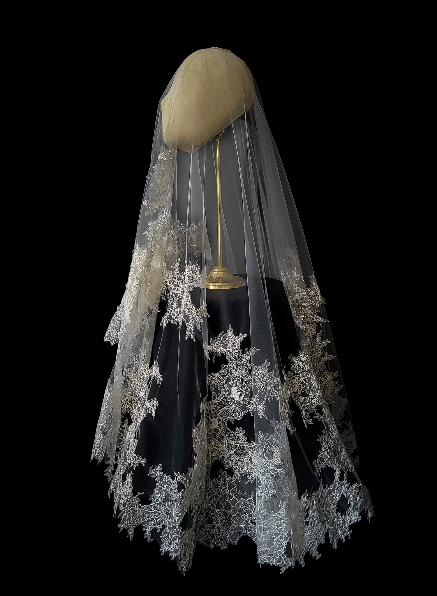 Modern, abstract alencon lace trimmed bridal veil with blusher by Twigs and Honey.