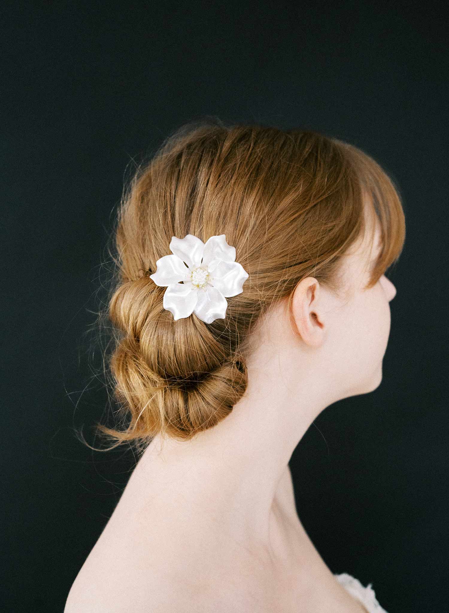 Modern and clean bridal hair flower accessory. Headpiece by Twigs & Honey