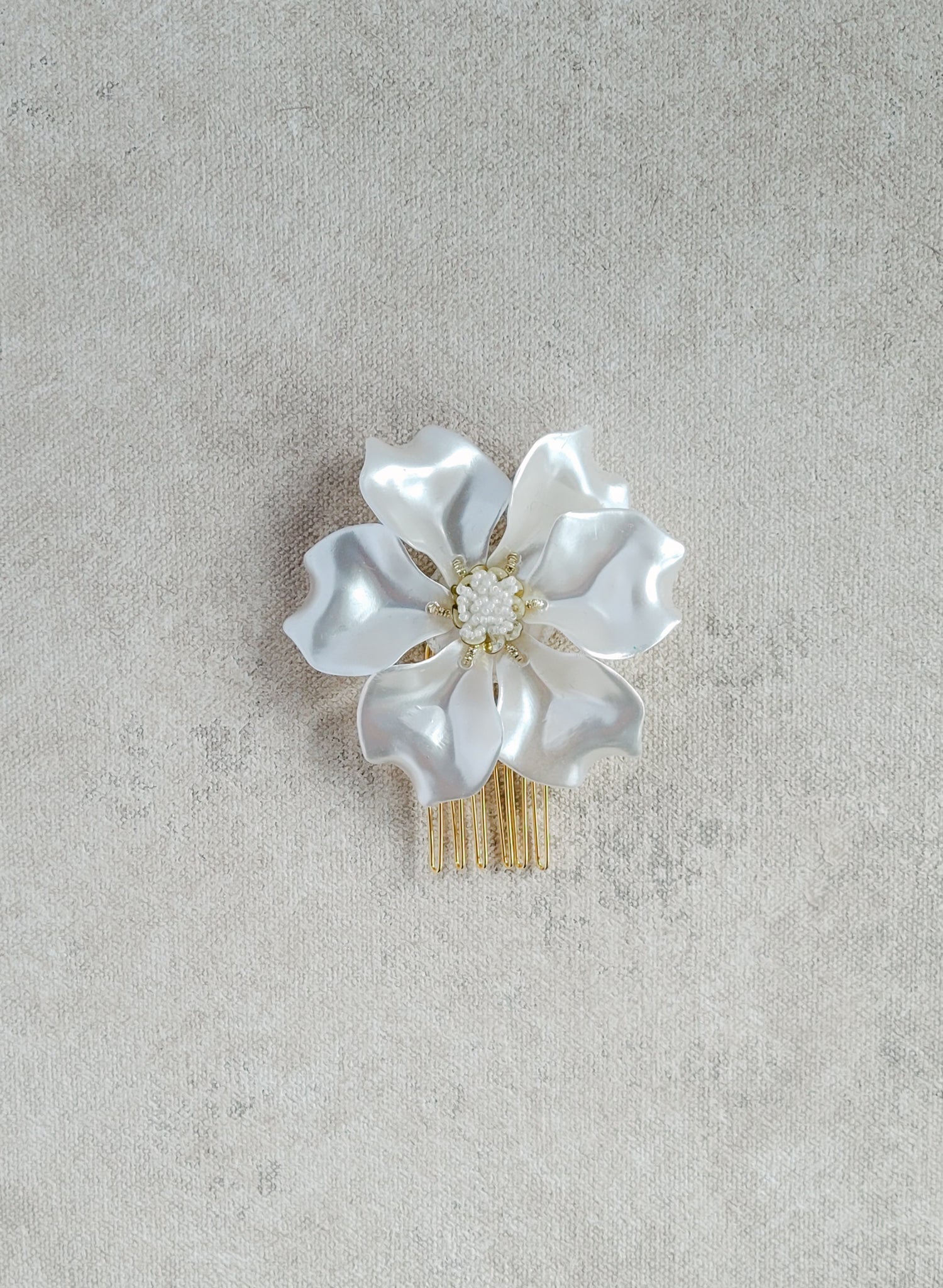 Modern and clean bridal hair flower accessory. Headpiece by Twigs & Honey