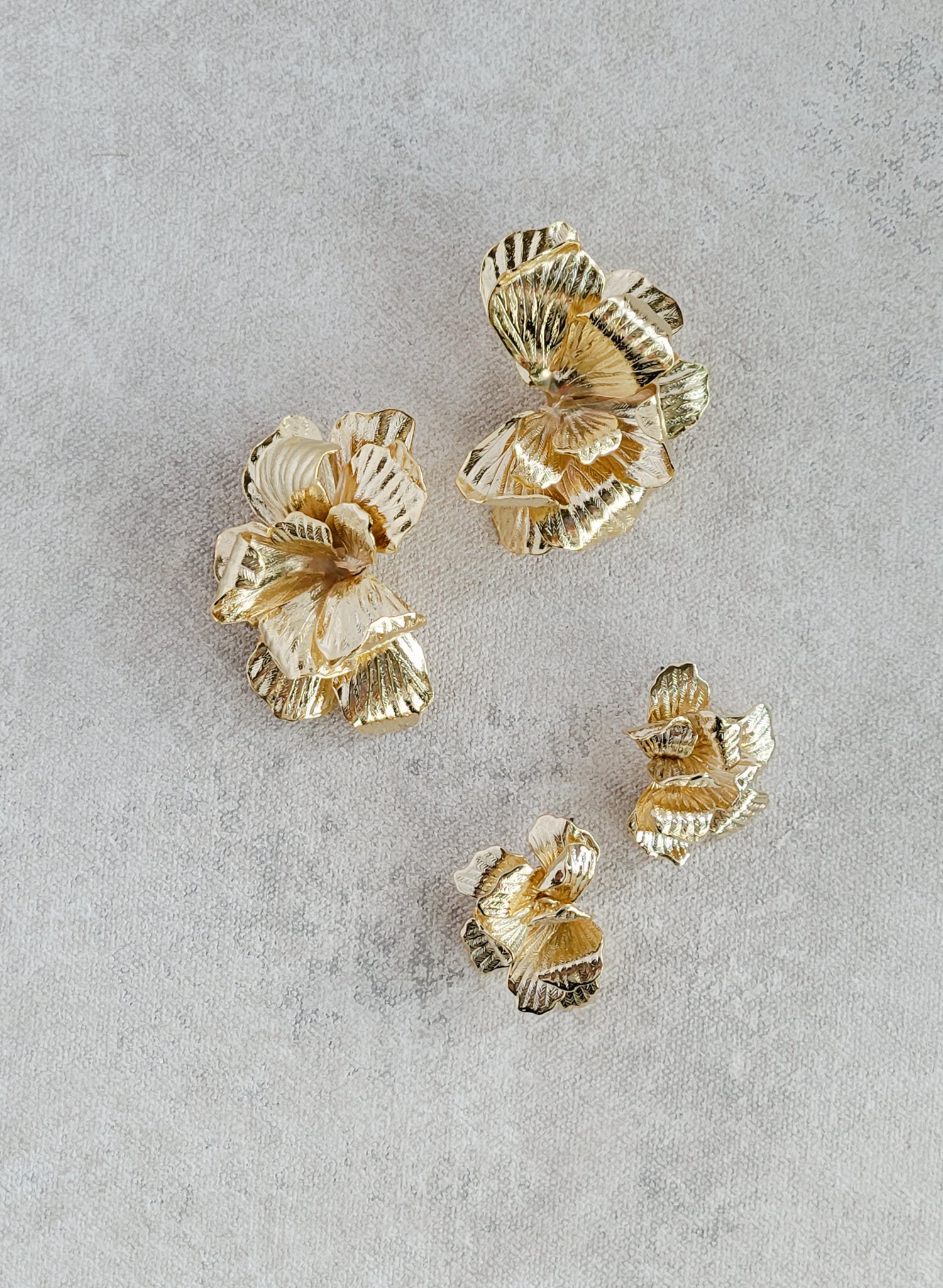 Abstract bent petal bridal earrings in gold. Post back. By Twigs and Honey