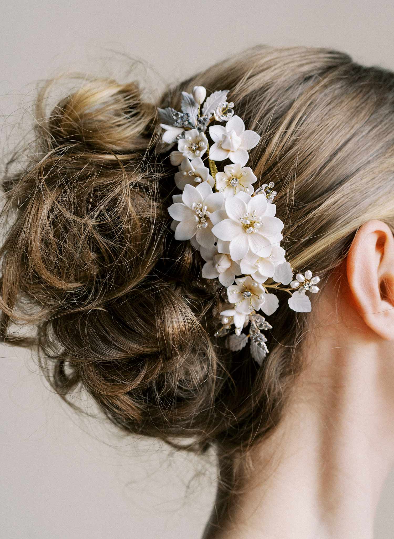 Intricate bridal hair comb with handmade clay flowers, freshwater pearls, Austrian crystals and leaves. By Twigs & Honey