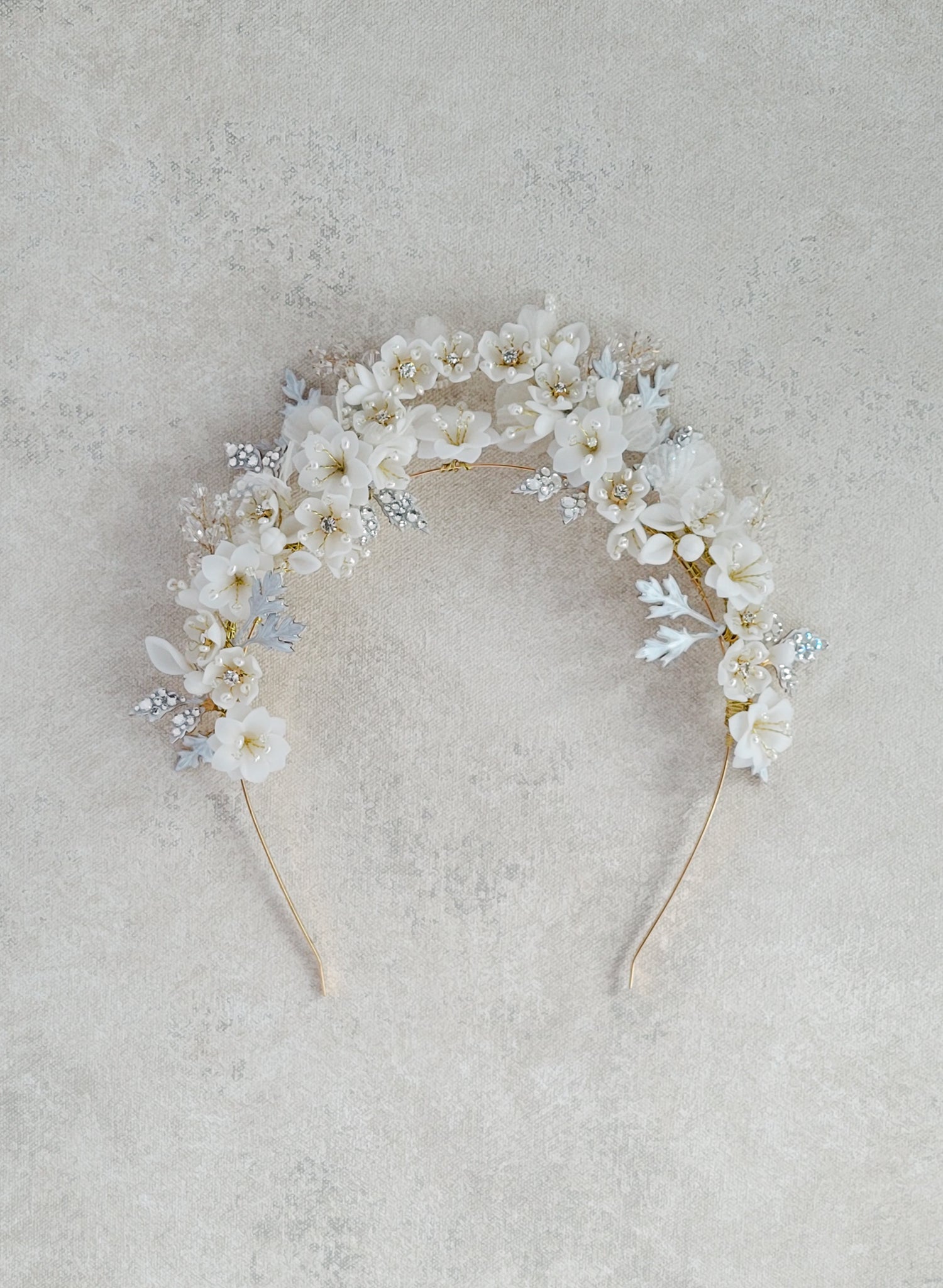 Lush floral and sparkle raised bridal tiara - Style #2560