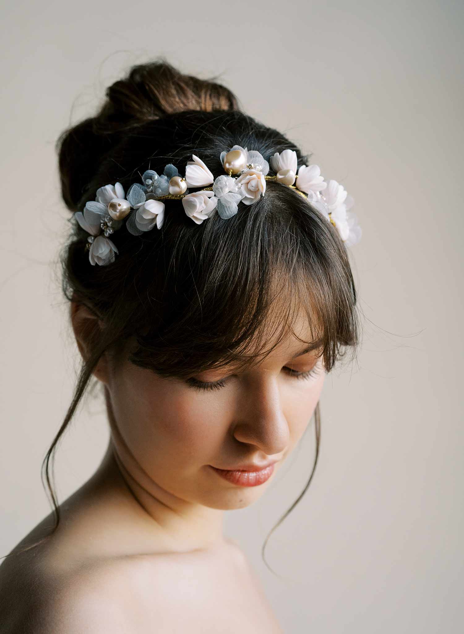 Bridal hair vine with hand sculpted clay magnolia flowers and silk petals by Twigs and Honey