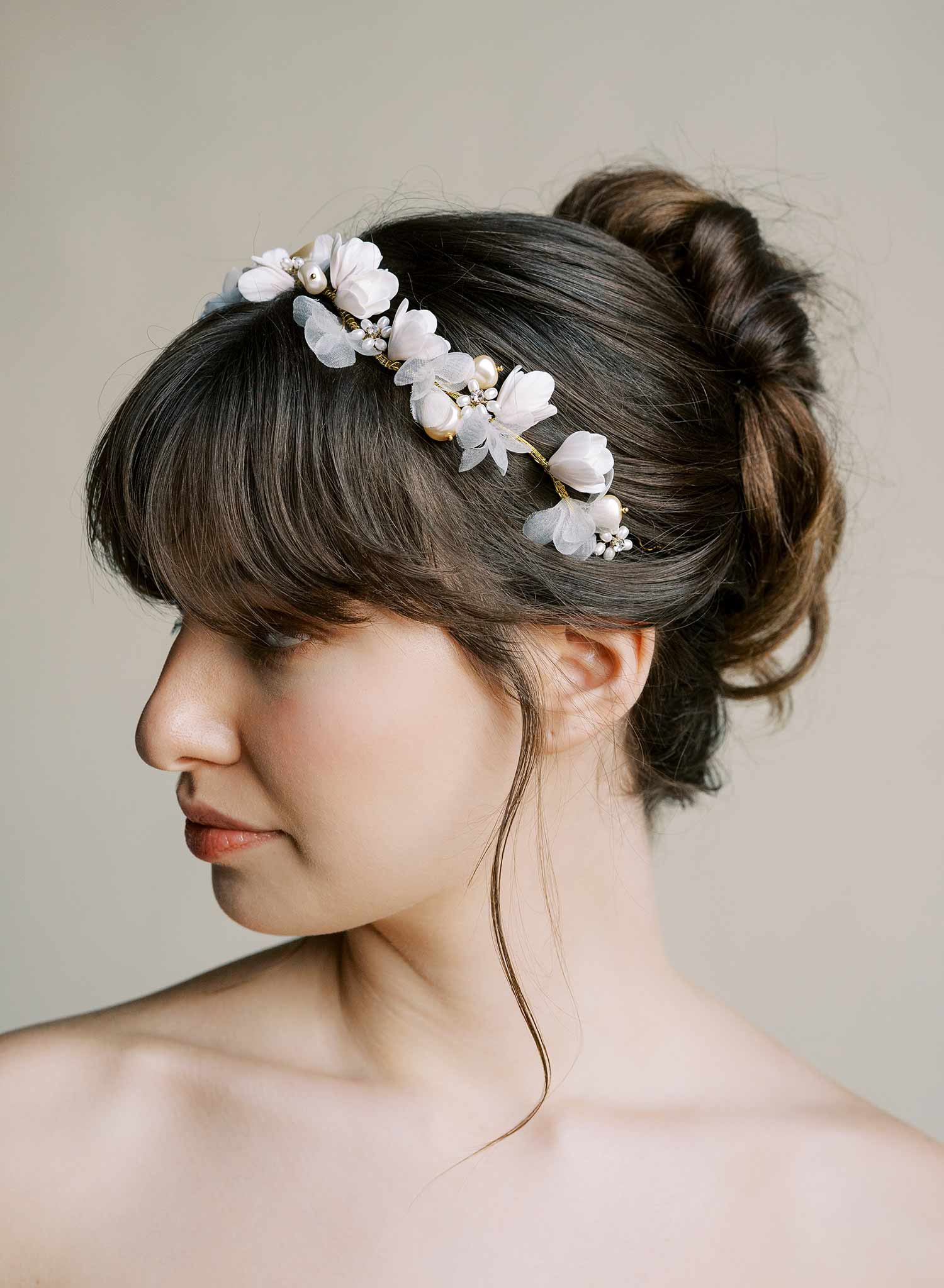 Bridal hair vine with hand sculpted clay magnolia flowers and silk petals by Twigs and Honey