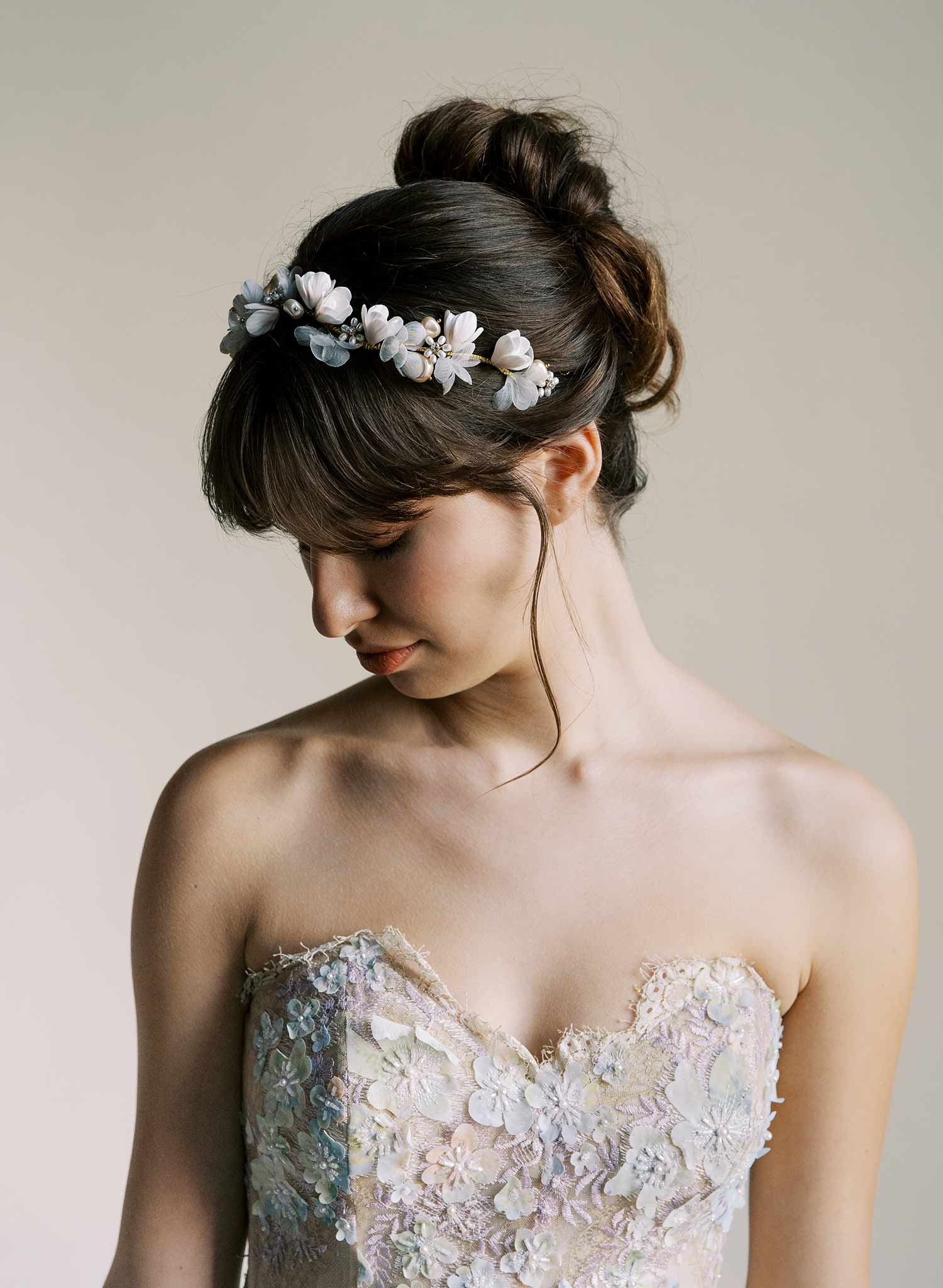 Bridal hair vine with hand sculpted clay magnolia flowers and silk petals by Twigs and Honey