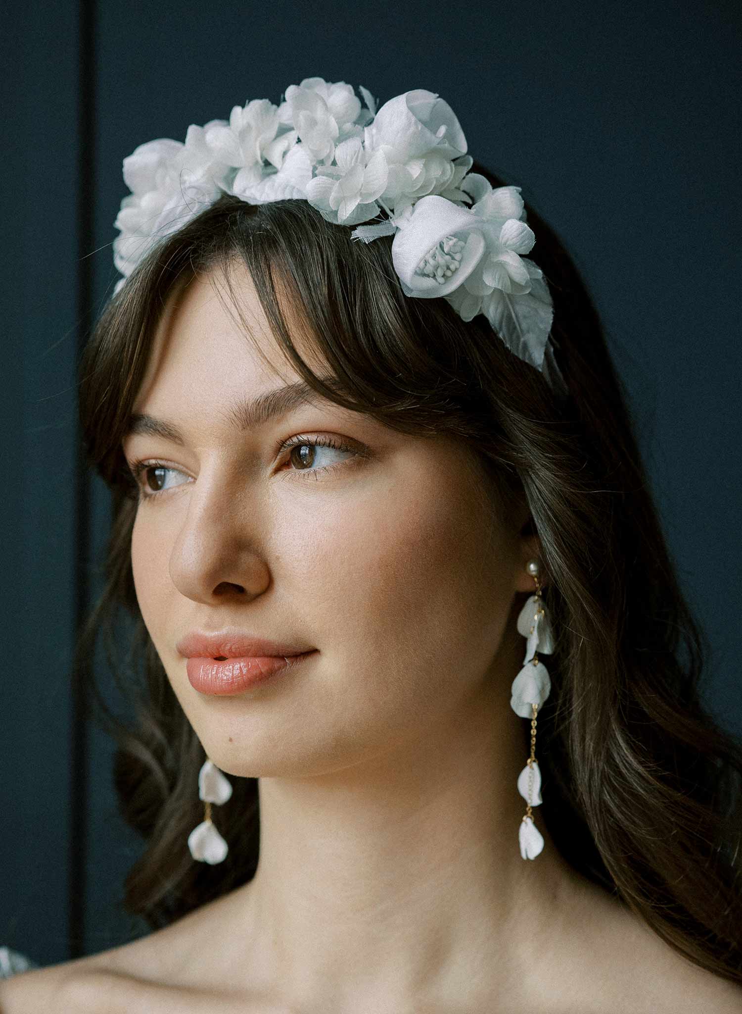 Long, dangling chains bridal earrings with floral sculpted petals by Twigs and Honey