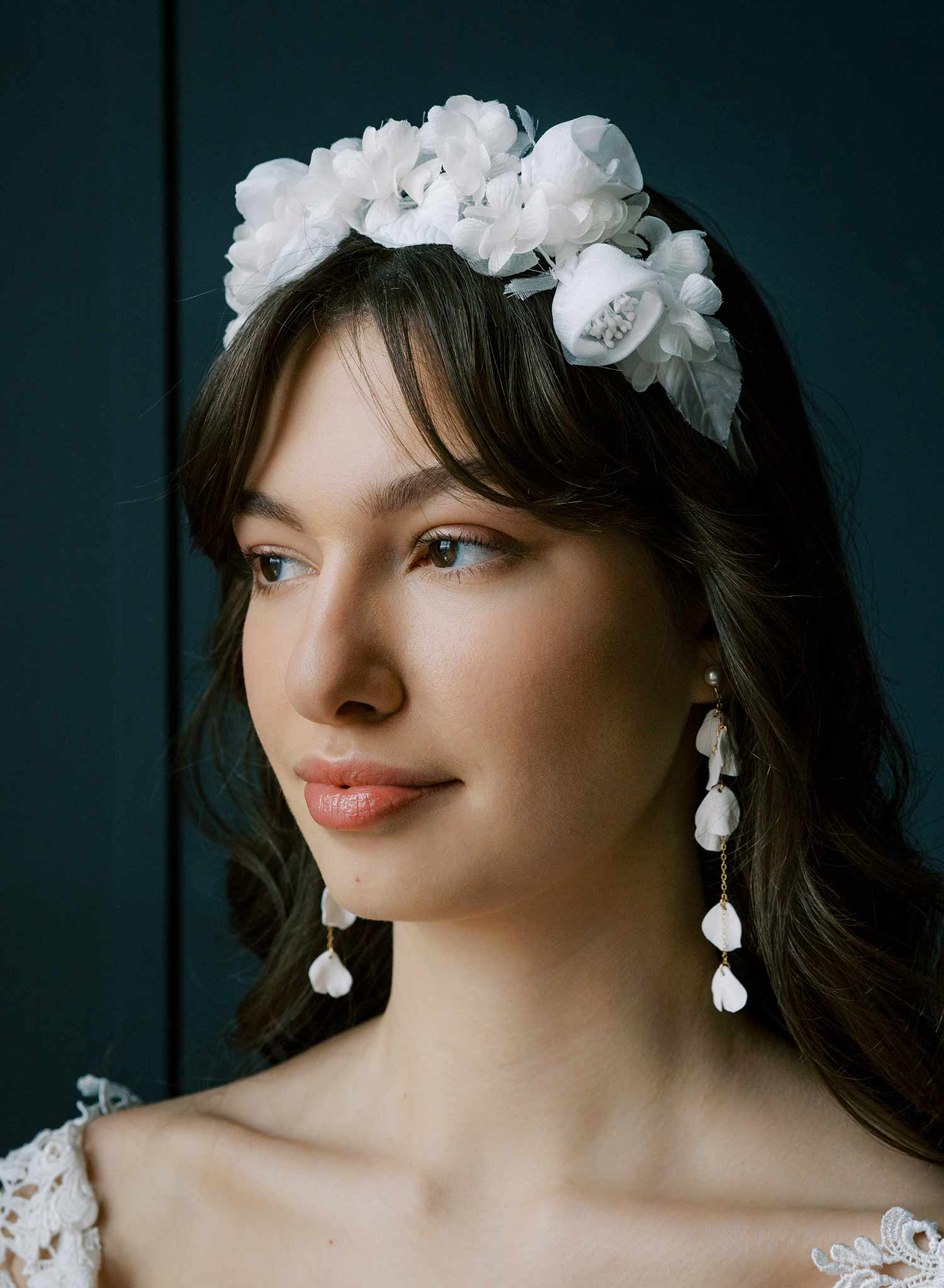 Long, dangling chains bridal earrings with floral sculpted petals by Twigs and Honey