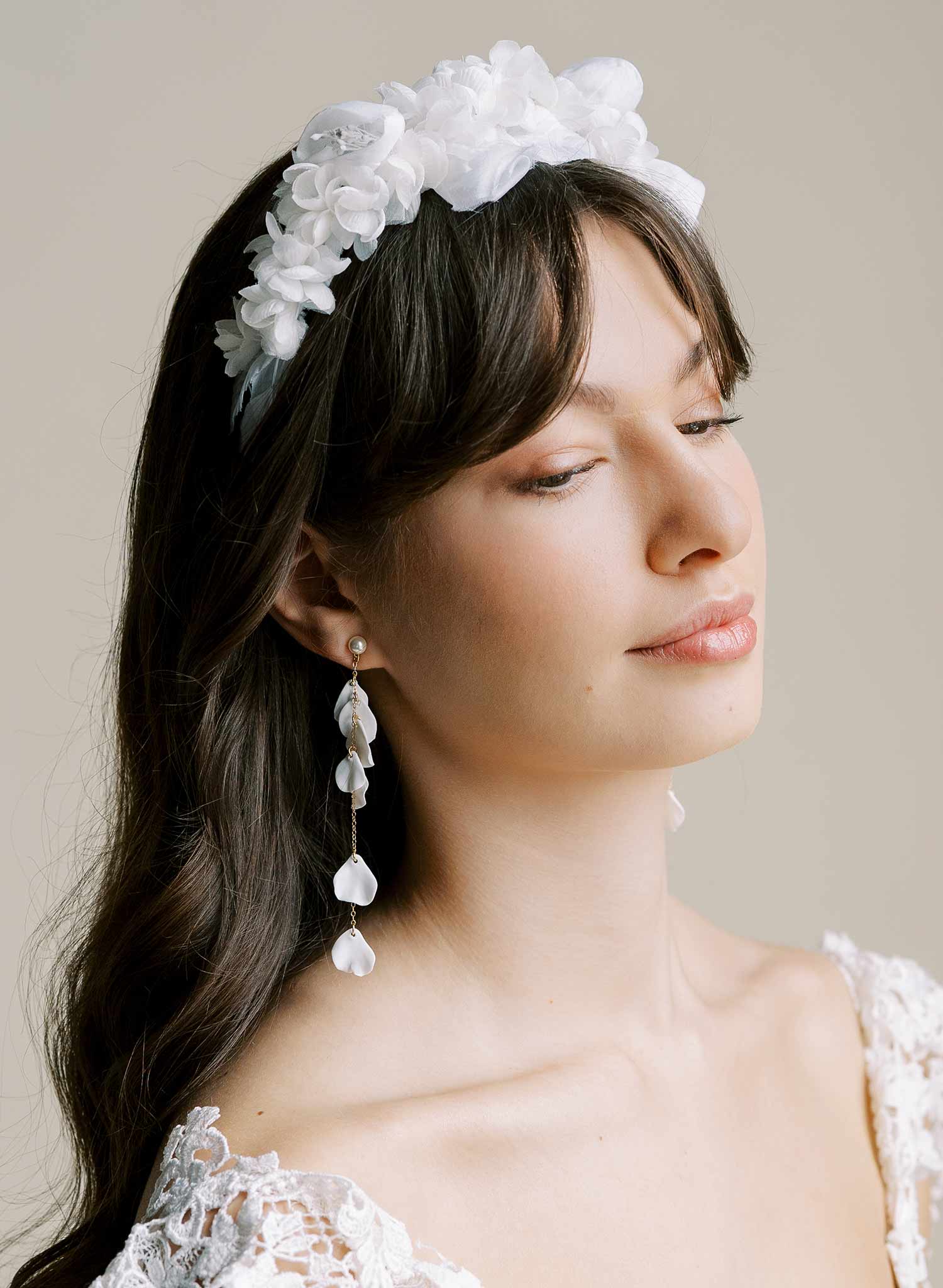 Long, dangling chains bridal earrings with floral sculpted petals by Twigs and Honey