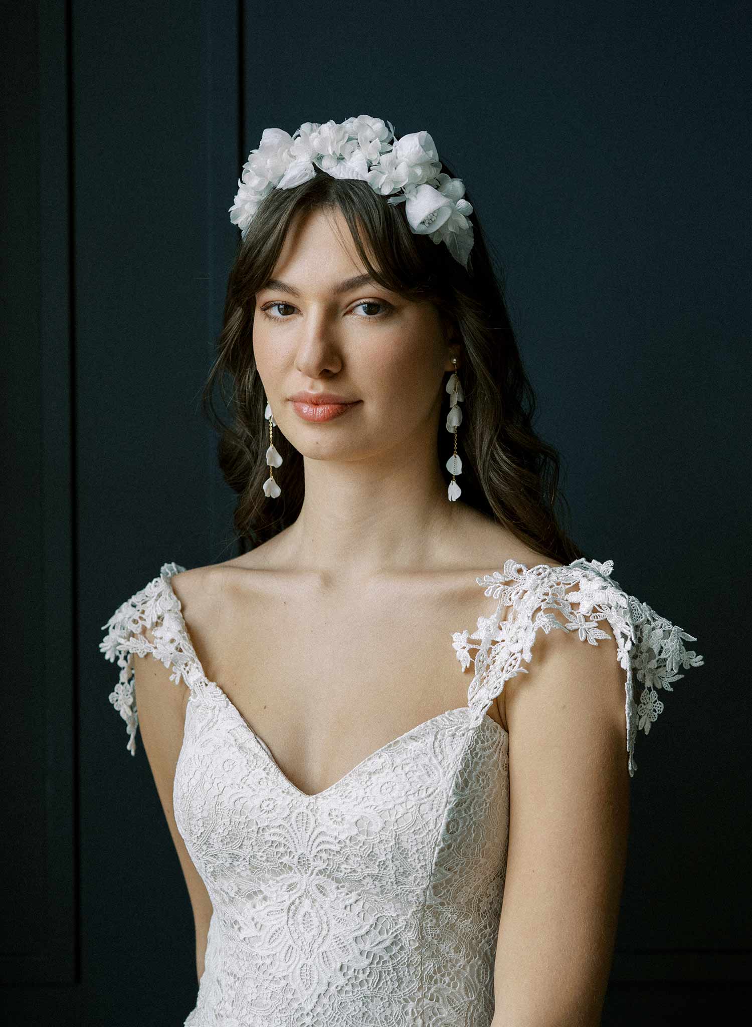 Long, dangling chains bridal earrings with floral sculpted petals by Twigs and Honey