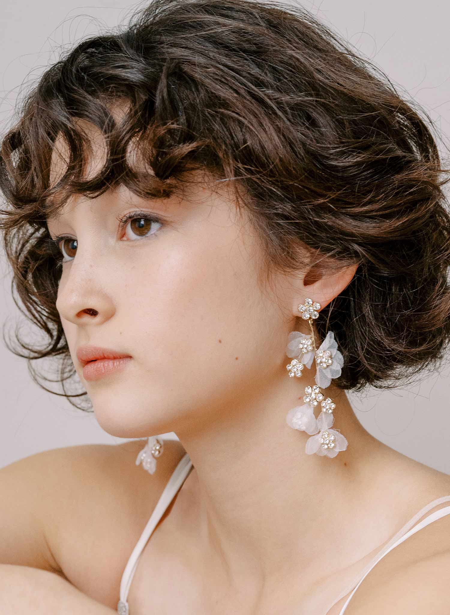 https://www.twigsandhoney.com/cdn/shop/products/2304-crystal-petal-bridal-earrings-twigsandhoney-e.jpg?v=1671511888