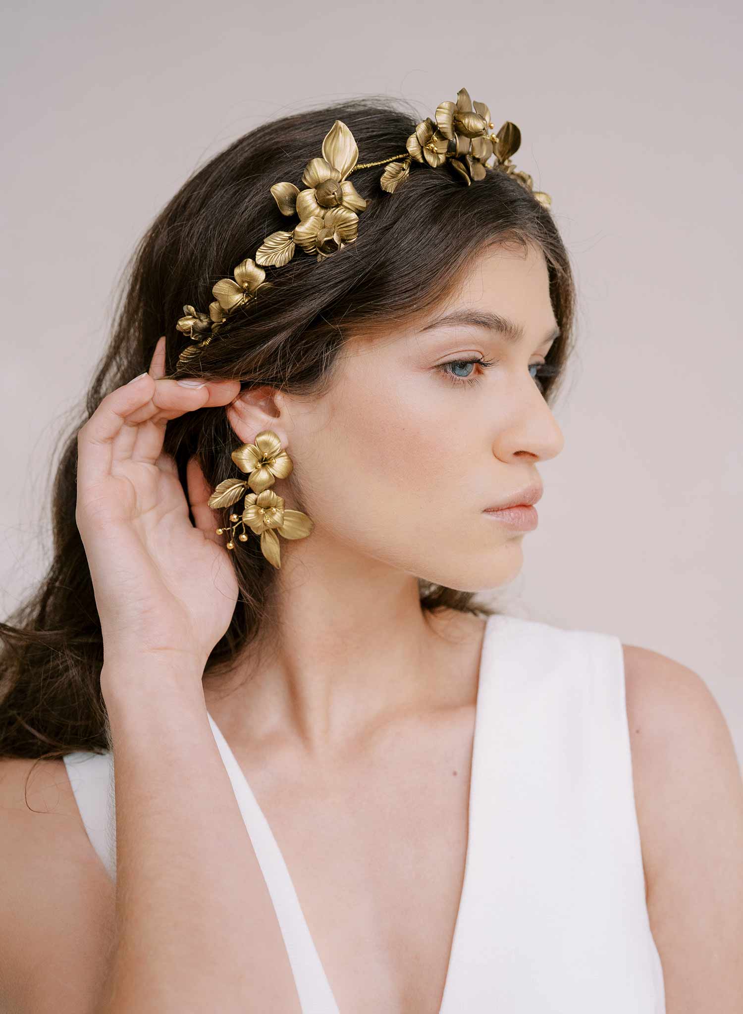 gold colored flower cluser earrings by twigs and honey