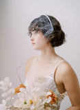 https://www.twigsandhoney.com/cdn/shop/products/2350-bridal-birdcage-veil-headband-twigsandhoney-c_compact.jpg?v=1671517021