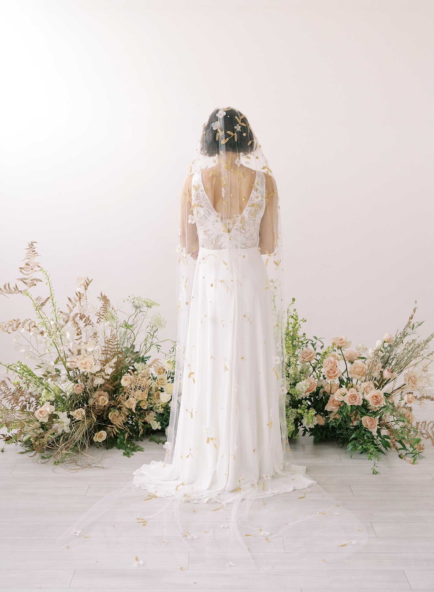 https://www.twigsandhoney.com/cdn/shop/products/2390-floral-embroidered-cathedral-train-veil-wedding-twigsandhoney_2048x2048.jpg?v=1671520789