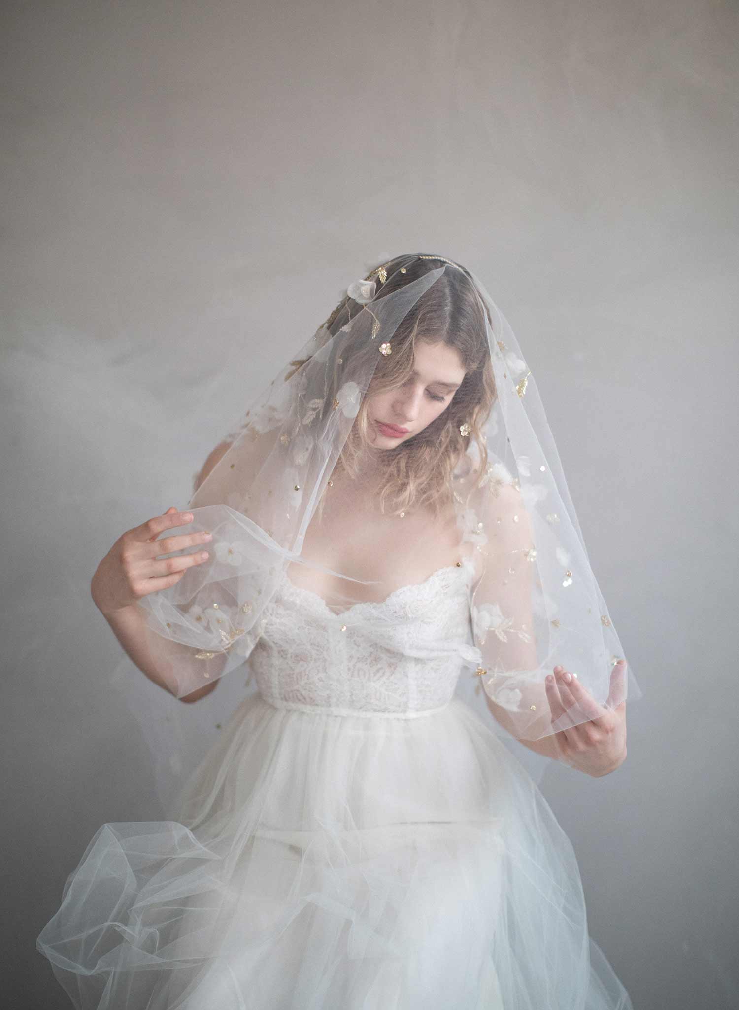 https://www.twigsandhoney.com/cdn/shop/products/864aa-embroidered-floral-leaf-bridal-veil-wedding-twigsandhoney_2048x2048.jpg?v=1594959862