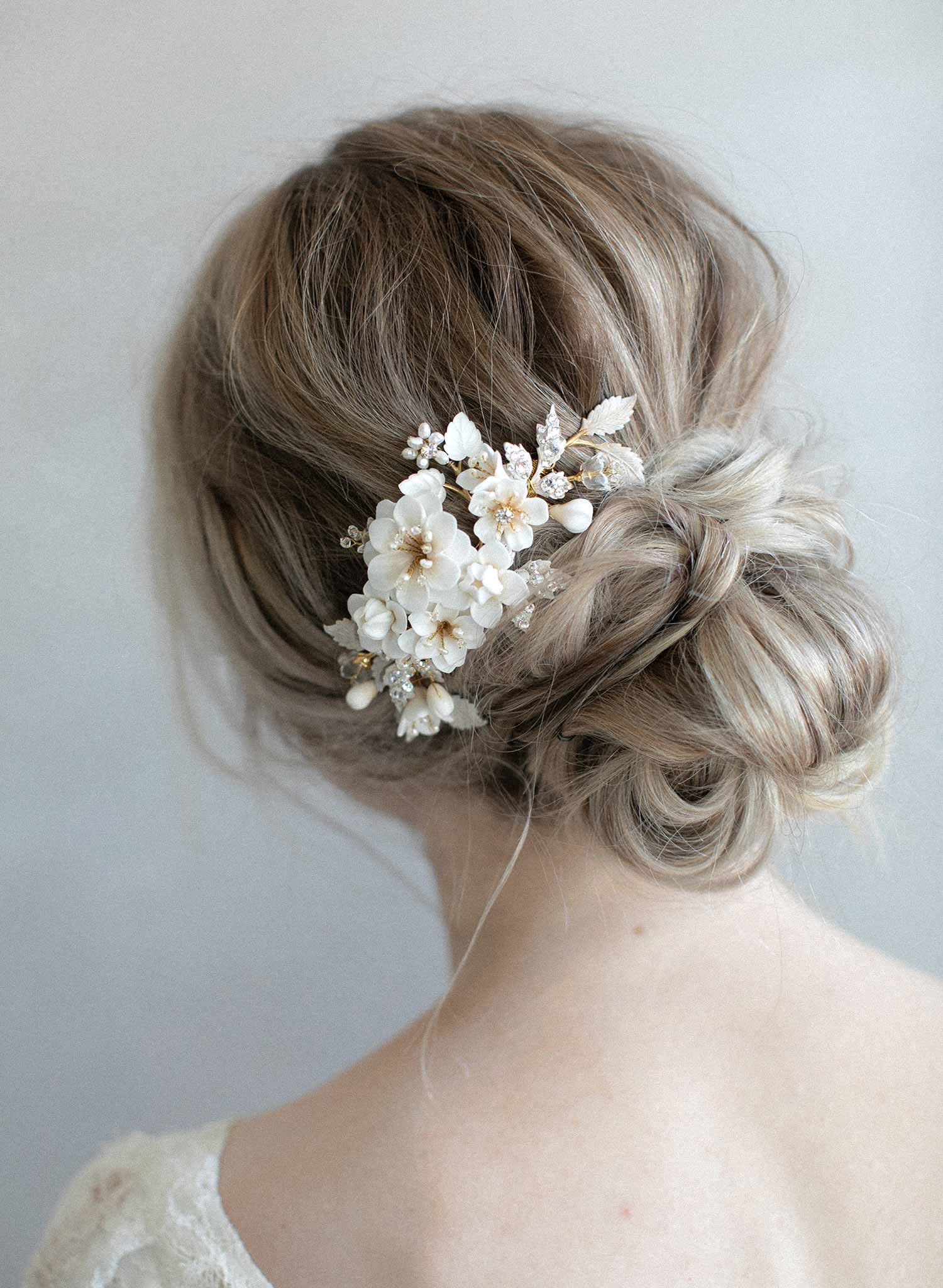 https://www.twigsandhoney.com/cdn/shop/products/978-bridal-ivory-cream-hair-flowers-bridal-comb-headpiece-twigsandhoney_0008-MAIN.jpg?v=1564459270